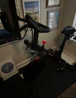 Peloton bike with screen & accessories