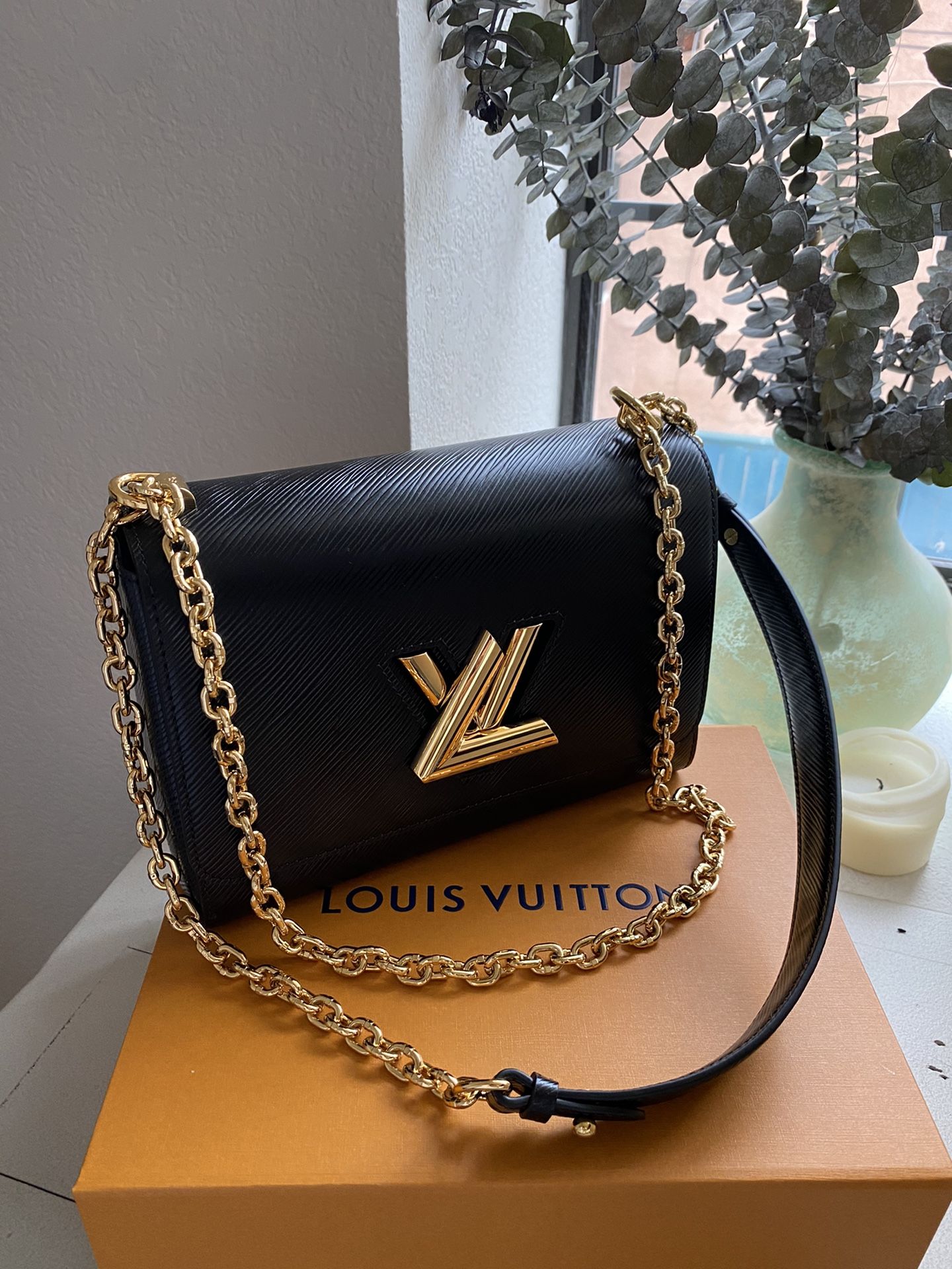 Classic Louis Vuitton mm black twist bag