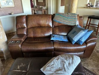 Leather sectional couch (modular) by Travis (color is cognac)