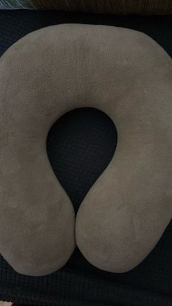 Brown neck pillow