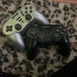 The image features Pelican Predator wireless controllers for the PlayStation 2 console