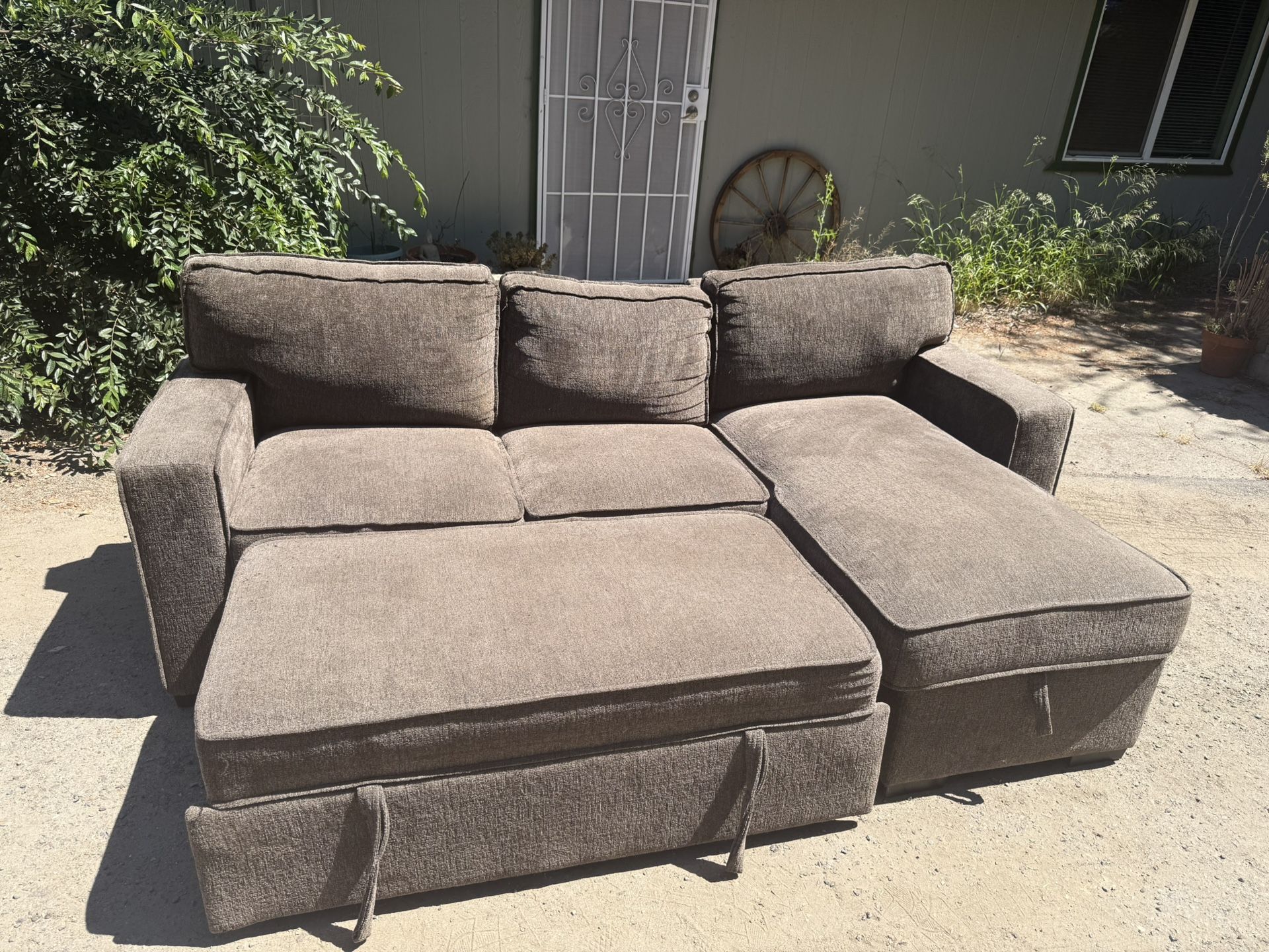 Soft brown Fold Out Couch W/ Storage