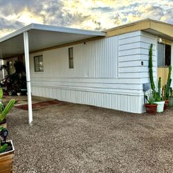 Mobile home, single wide.