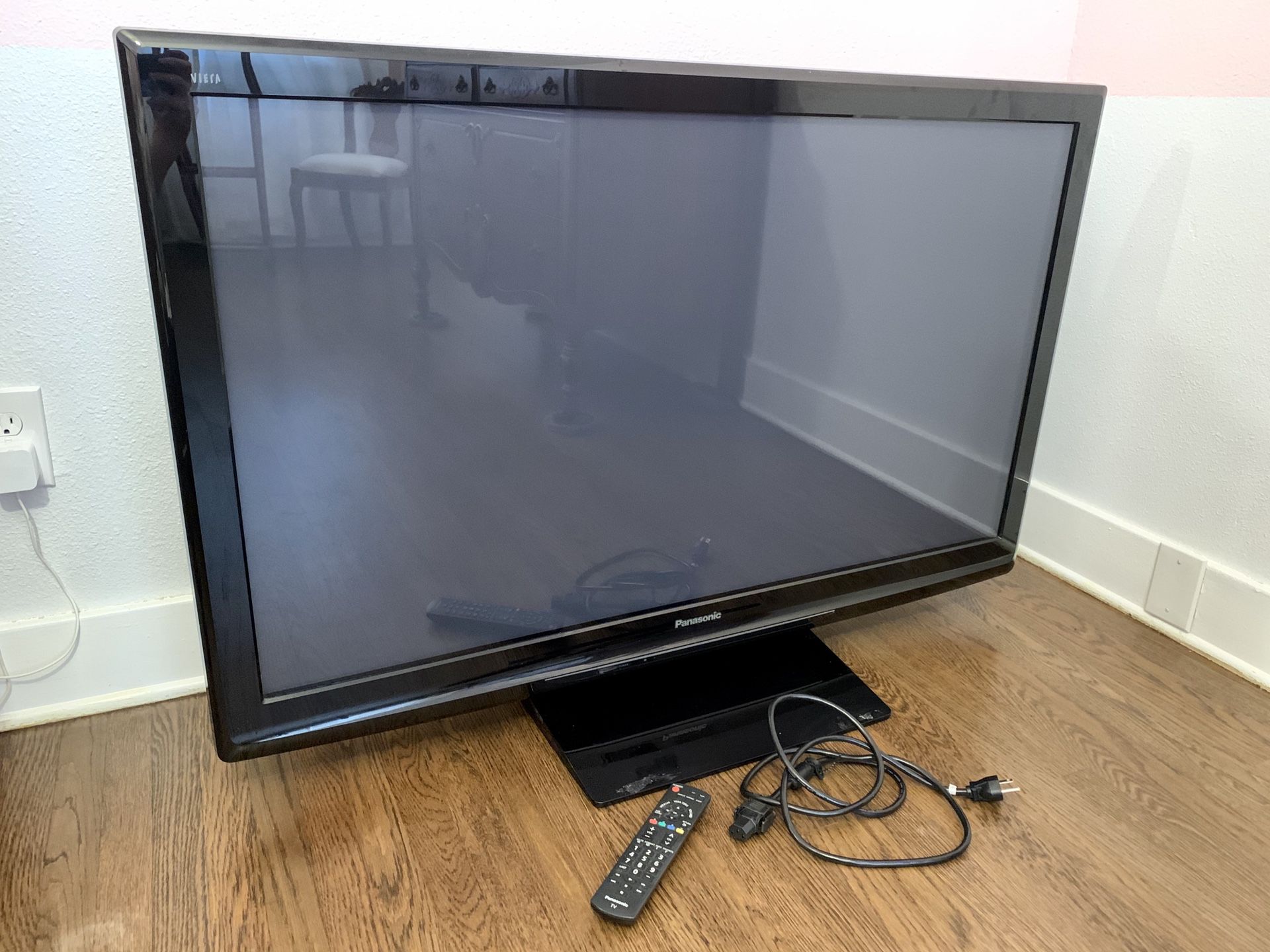 Plasma 50 inch television. Includes remote and power cable. 50” TV.