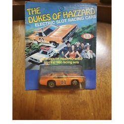 General Lee Electric Slot Car on Card.  BRAND NEW OLD STOCK 