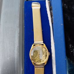 Rouan gold watch