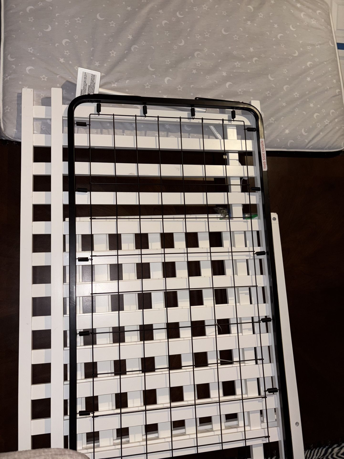 White Baby Crib With A Mattress