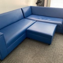 Blue L shaped sofa w ottoman