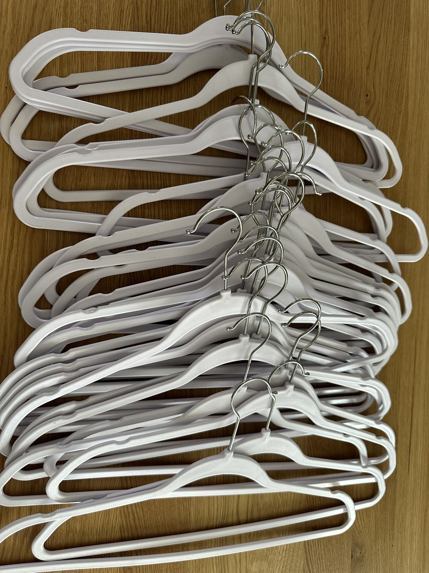 90 White Plastic Hangers