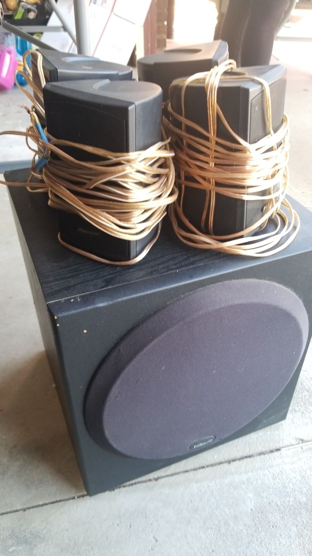 4 Pioneer Speakers and a Polk Audio Bass