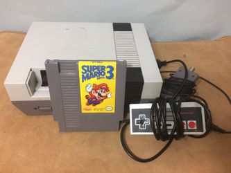 Nintendo Nes With Controller and Super Mario 3