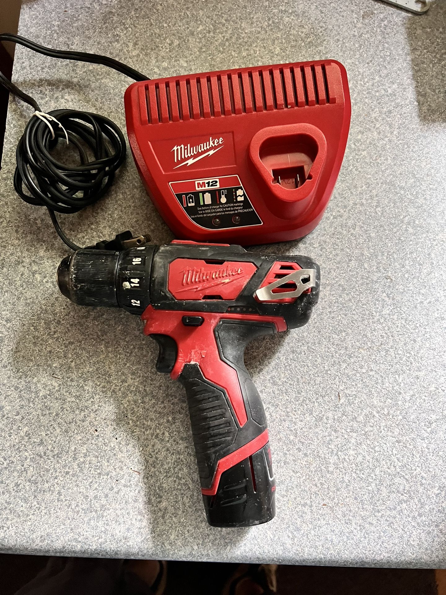 Milwaukee M12 Drill Battery And Charger