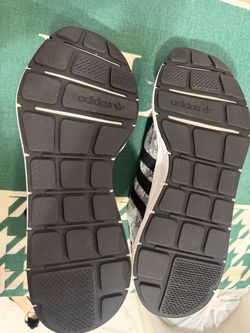 Brand new Nikes—I bought them, but they were too short. Size 10.