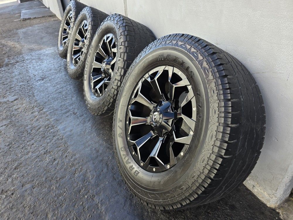 20" Fuel Assault rims 20x9 w- 35" AT tires 