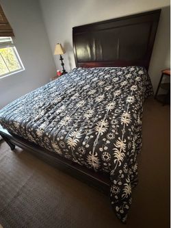 Solid wood queen sized bed frame
