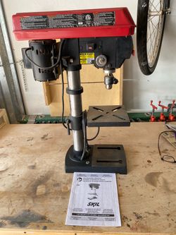 Skil 10” bench top drill press. Hardly used.Used- like new.