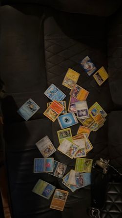 Bucket of open pokemon cards