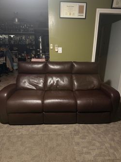 Brown reclining sofa set