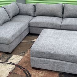 Gray 2pc Sectional And Ottoman