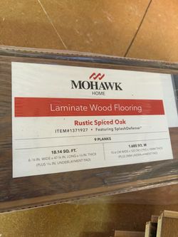 Mohawk Home Rustic Spiced Oak Laminate Wood Flooring – 18.14 Sq. Ft. Per box 7.5 boxes total