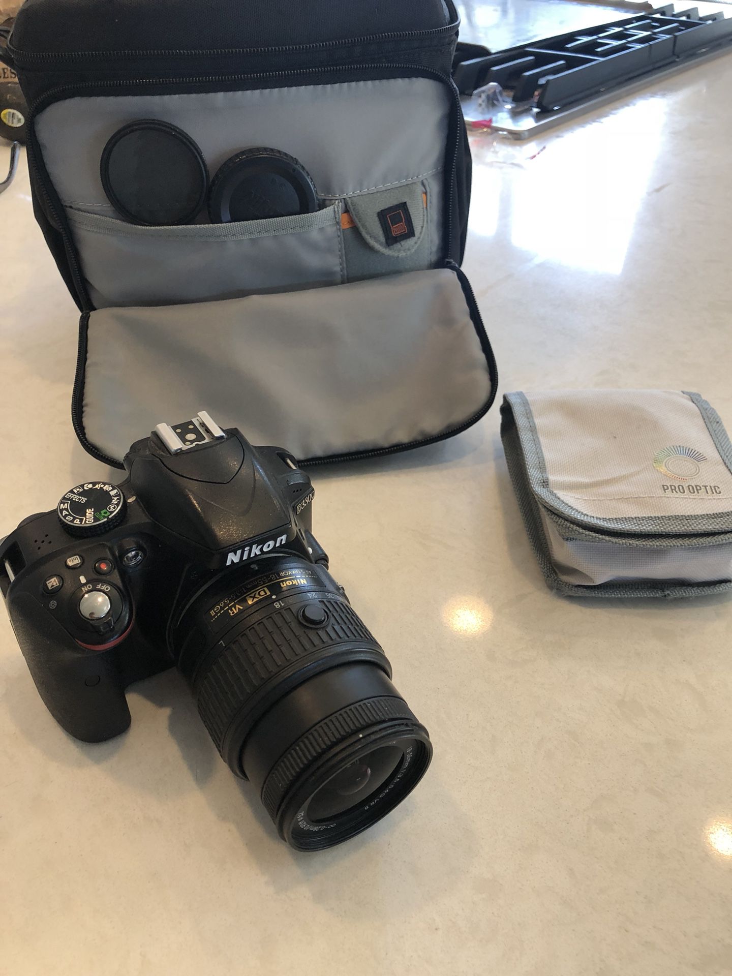 Nikon D3300 with 18-55mm lens and Lowepro carrying case
