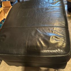 2 Premium Black Leather Ottomans – Excellent Condition
