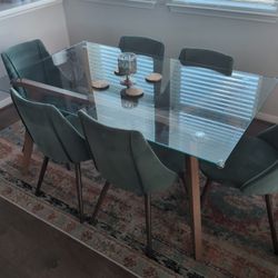 Glass Dining Table With 6 Chairs And Rug $250