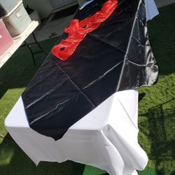 PARTY SUPPLIES TABLE COVERS AND BOWS....6 DOLLARS WHITE TABLE COVERS...4 DOLLARS MIDDLE SQUARES...75 CENTS EACH BOW...