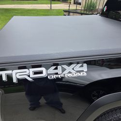 Brand new cover for a toyota tacoma, pickup truck..