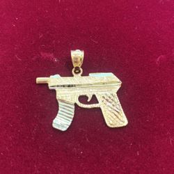 10 K Y GOLD SOLID GUN CHARM 