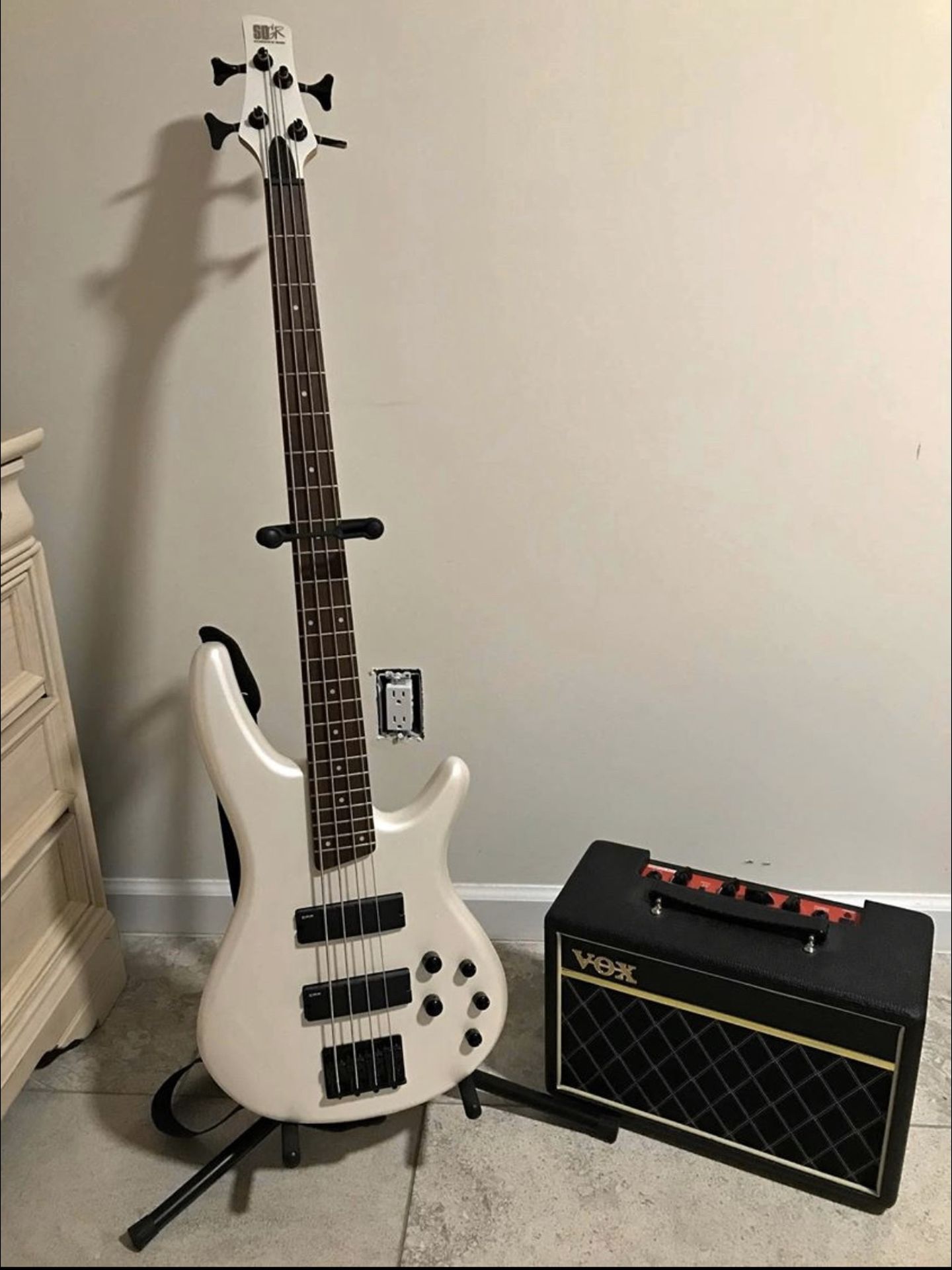 Bass guitar and speakers