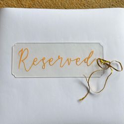 “Reserved” Signs