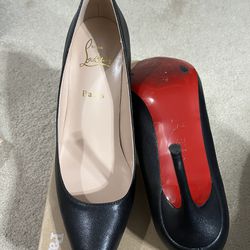 Black Red bottoms size 10