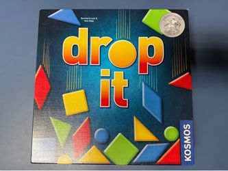 The Kosmos Drop It board game is a strategy game that is perfect for parents and families. With a Parents' Choice Silver Award, this complete game is 