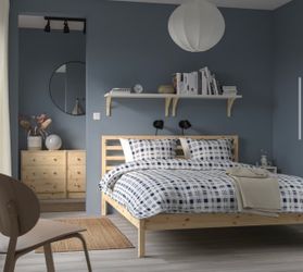 Brand new IKEA TARVA Queen bed frame pine with Luröy slats both still in original boxes.