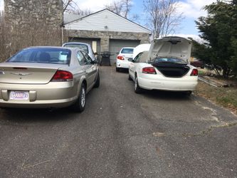 Here I have a white 2009 Toyota Carolla sedan model asking 3000 with 200,000 miles on it, 2005 PT CRUISER SILVER SEDAN MODEL asking 3,000 miles low,