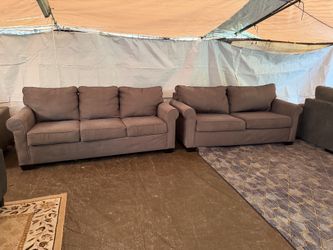 Gray couch and love seat they both have pullout beds great condition clean we saw all the time delivery $40 local