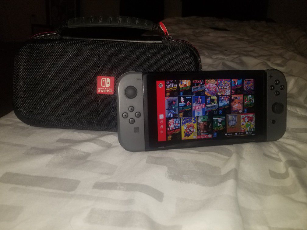 Nintendo switch with carry case and controllers