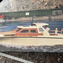 The Robbe St. Tropez is a popular vintage radio-controlled (RC) cabin cruiser boat kit from Germany, known for its realistic, stylish design often res