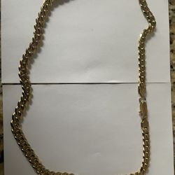 20” Cuban Chain (stamped 14K).