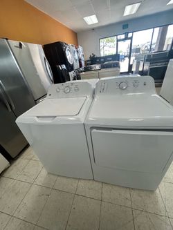 GE white top load washer and dryer set stainless tub