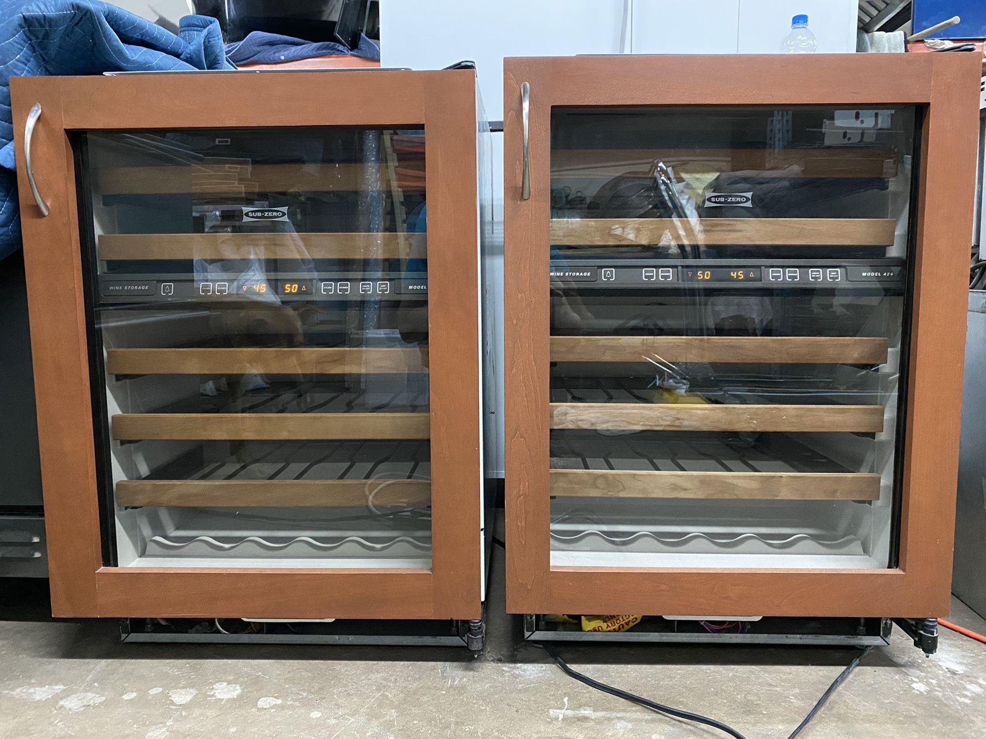 Sub zero 424 wood paneled wine fridge 80 bottle each 2 available. dual