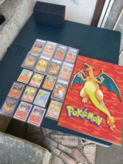 Big Collection of Charizard $1500! All 19 & Frame pic. $888 just Graded Cards. $600! All single raw Pokémon single cards. $350! Frame. All for $1500! 