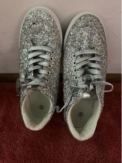 Silver tennis shoes are, I wore them once for work glider day