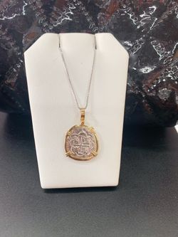 Atocha silver coin pendant in gold bezel with silver chain