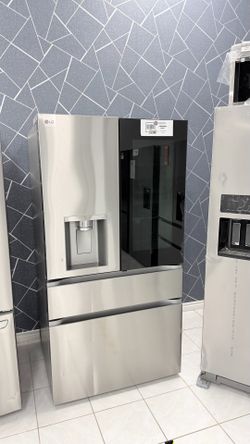 Four-door stainless steel refrigerator with glass door