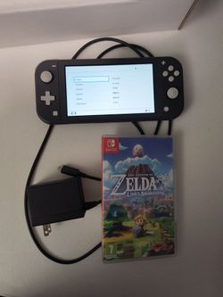 Barely used Nintendo Switch lite with game works perfect