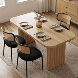 4 dining chairs. Black with rattan back