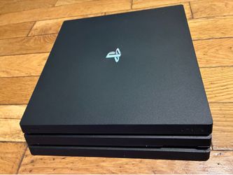 PlayStation 4 Pro With 2 DualShock Controllers