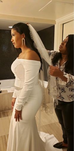 White Off-Shoulder Long Sleeve Wedding Gown